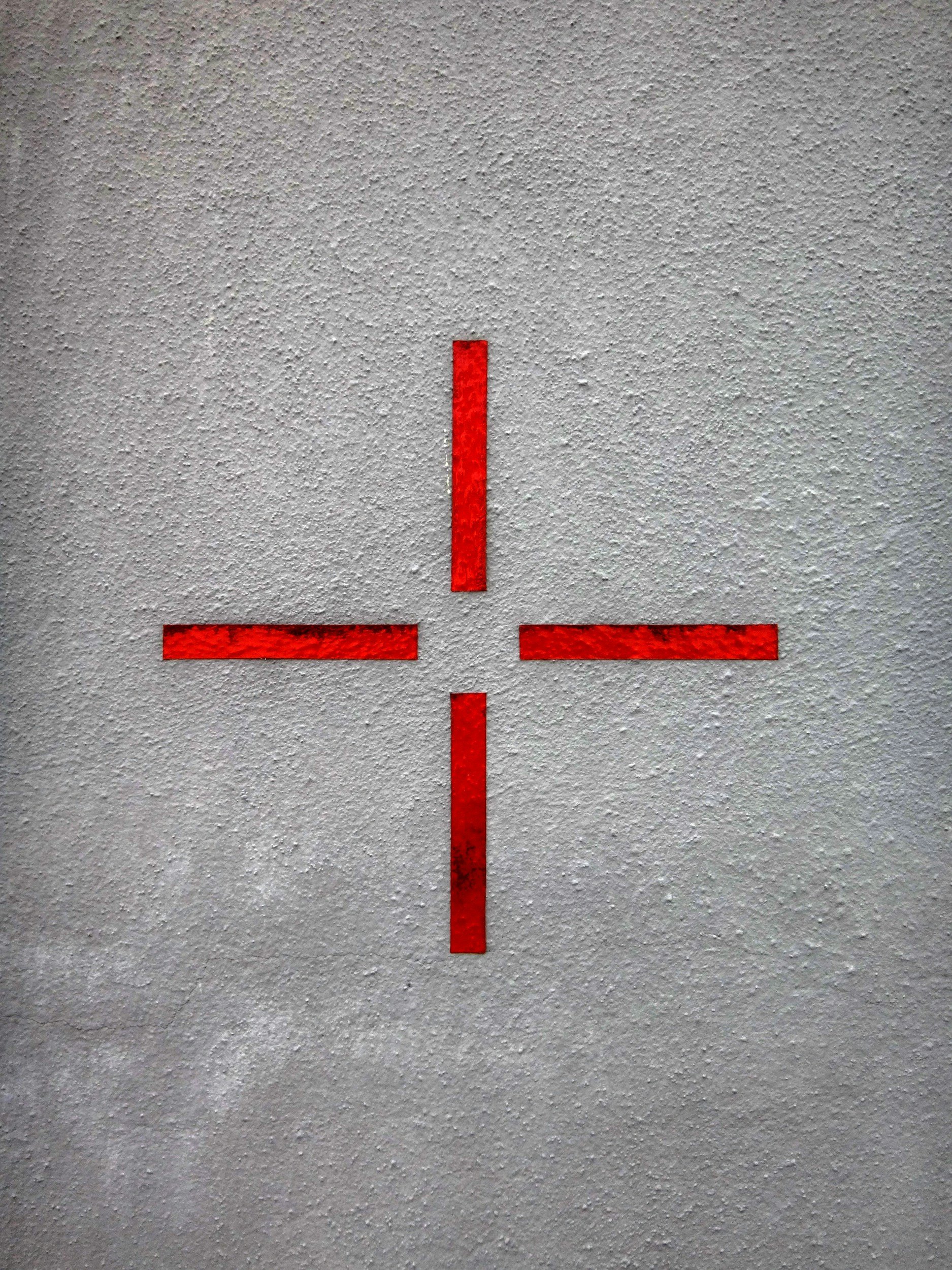 red crosshair symbol